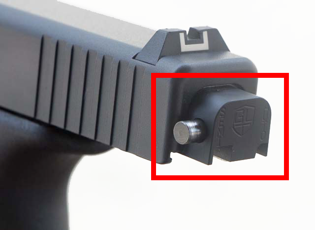 An image showing a Glock switch installed on the back of a Glock's slide.