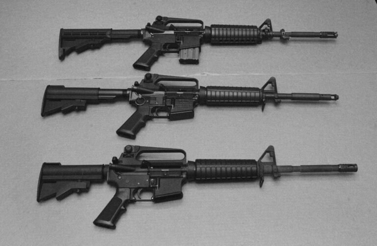 Three AR-15s are on display