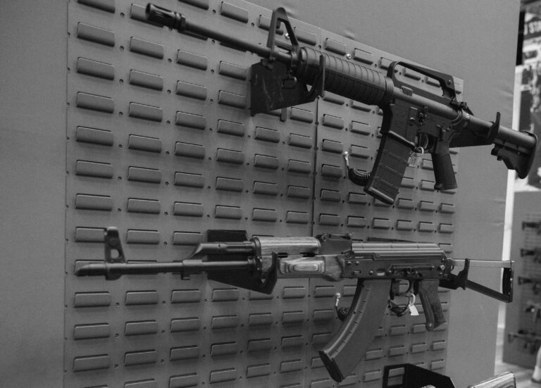 An AR-15 and AK-47 are on display at the NRA's annual convention.