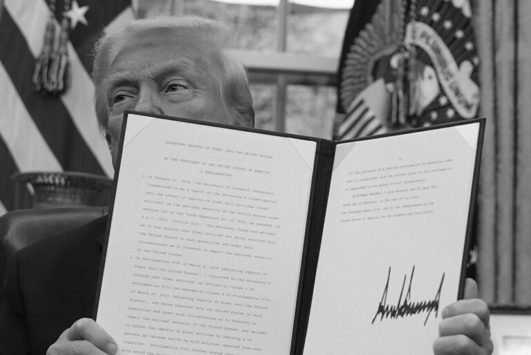 President Donald Trump displays an proclamation regarding steel imports in the Oval Office on February 10, 2025. The order could affect gun prices.