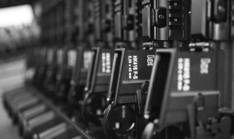 HK416 rifles are shown on a rack at the Heckler & Koch factory in Germany. Jason Wong's company, Hurricane Butterfly, garnered attention for importing a variant of the HK416 to the U.S.