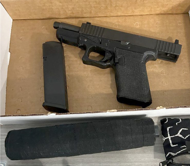 The homemade pistol and silencer used by the suspected killer of Brian Thompson. Like the pistol’s frame, the silencer was 3D printed from plastic. (SDNY Photo)