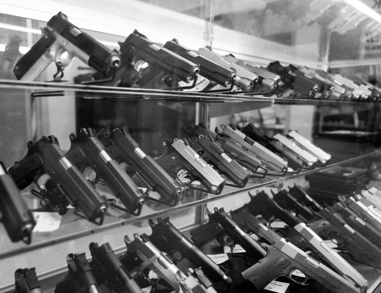 Several 1911-style pistols are shown for sale at a gun shop. Gun owners recently filed a lawsuit against the NSSF for misusing their personal data.